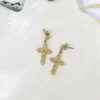 Diamond Cross Earrings by Lauren Kenzie