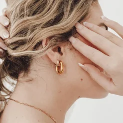 Flirty Fantasy Oval Hoop Earrings by Pretty Simple