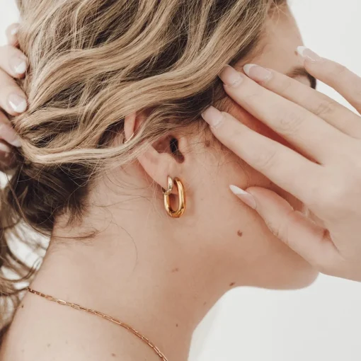 Flirty Fantasy Oval Hoop Earrings by Pretty Simple