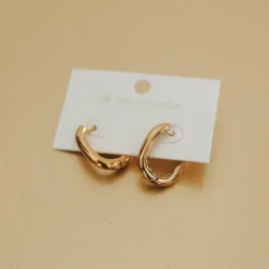 Flirty Fantasy Oval Hoop Earrings by Pretty Simple