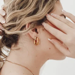 Flirty Fantasy Oval Hoop Earrings by Pretty Simple