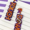 Glitter 'Touch Down' Football Dangle Earrings - Orange & Purple