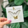 Golden Bow Necklace by Lauren Kenzie