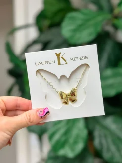 Golden Bow Necklace by Lauren Kenzie