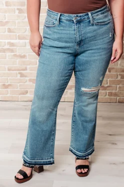 Isla Mid Rise Distressed Released Hem Bootcut Jeans by Judy Blue