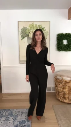 Onward & Upward Faux Wrap Jumpsuit In Black