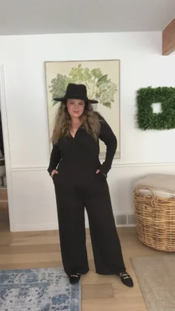 Onward & Upward Faux Wrap Jumpsuit In Black