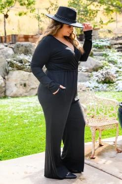 Onward & Upward Faux Wrap Jumpsuit In Black