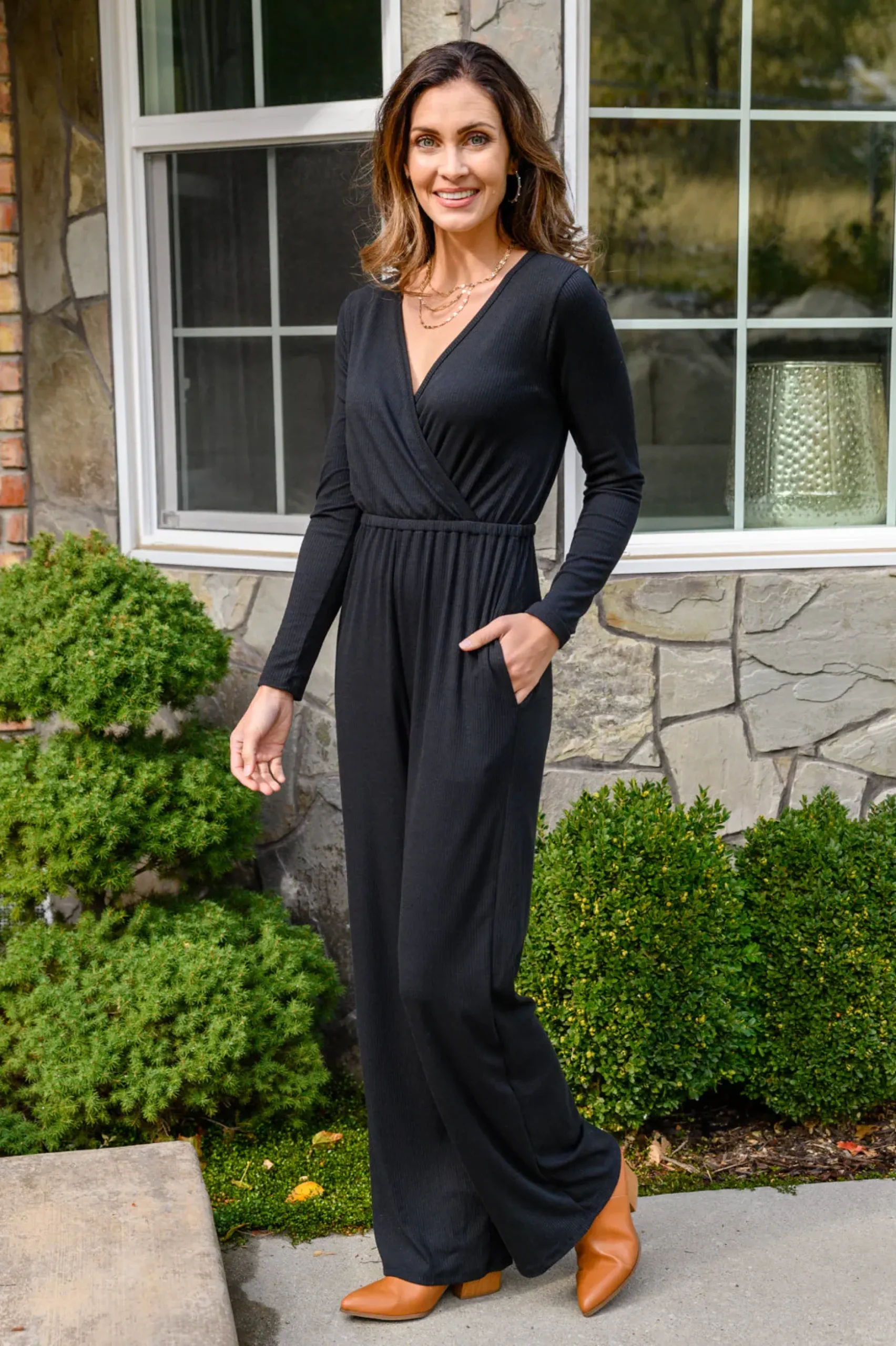 Onward & Upward Faux Wrap Jumpsuit In Black