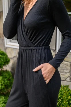 Onward & Upward Faux Wrap Jumpsuit In Black