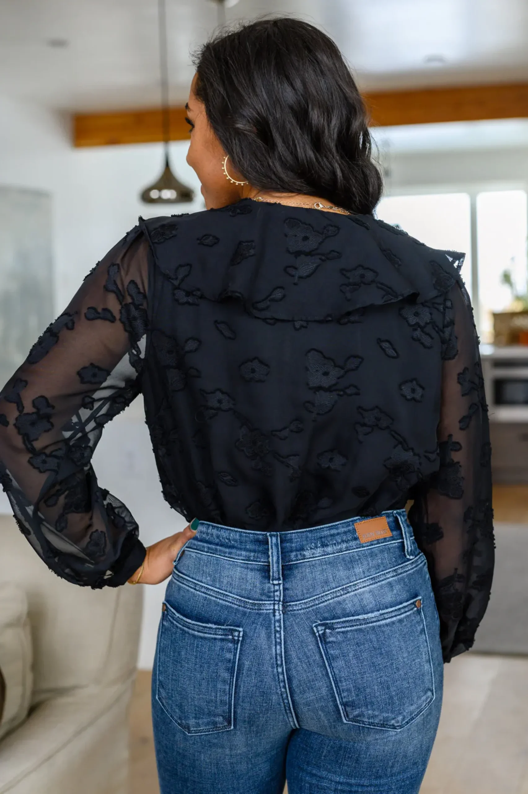 Think Of Me Ruffle Long Sleeve Bodysuit in Black