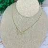 Whimsey Bow Necklace by Lauren Kenzie